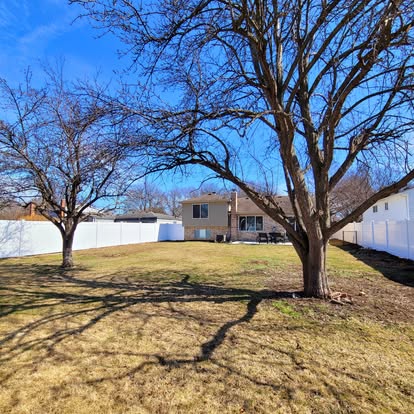 Backyard garden space in winter with play equipment