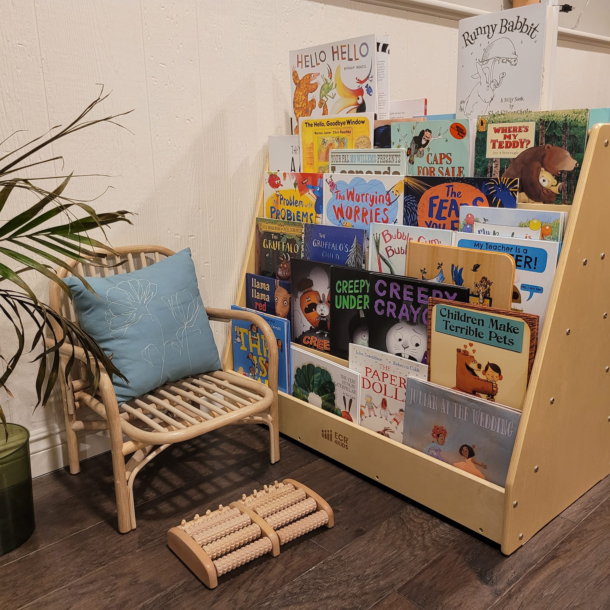Reading nook with bookshelf and rattan chair